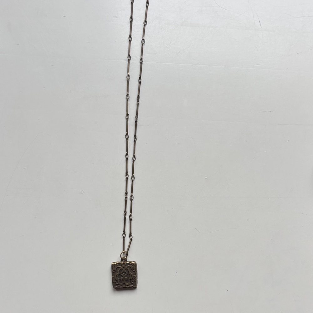 Intricate Silver Pendant Necklace
